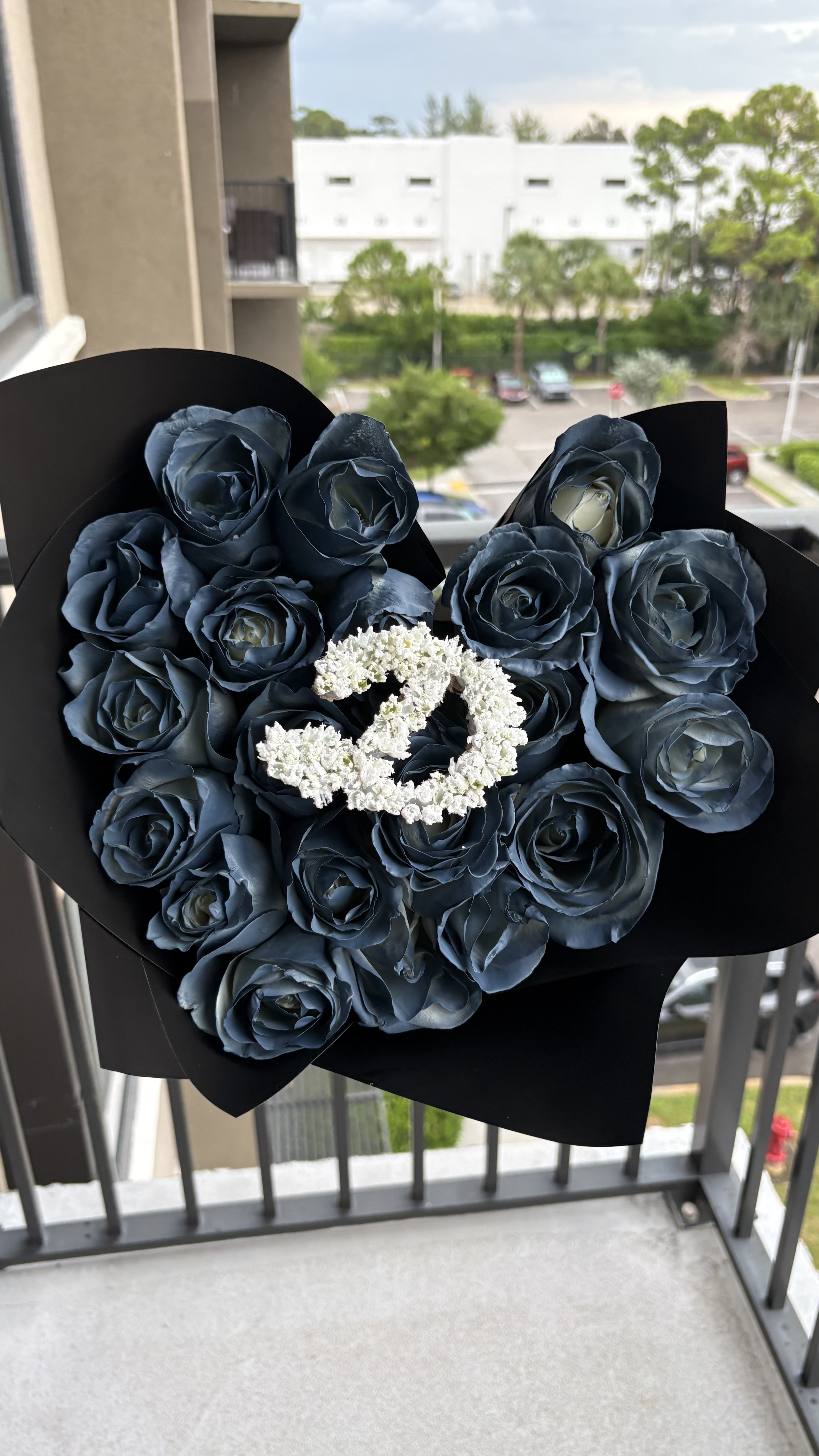 Blue rose heart bouquet with white floral letter D
